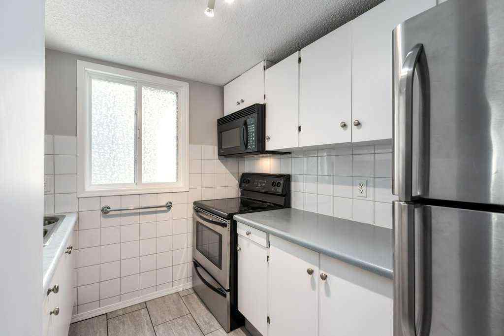 MLS® A2257022 - Unit #104 829 Coach Bluff Crescent SW in Coach Hill Calgary, Residential