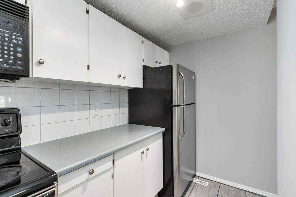 MLS® A2257022 - Unit #104 829 Coach Bluff Crescent SW in Coach Hill Calgary, Residential