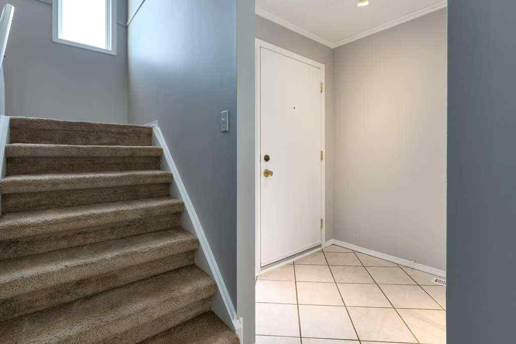 MLS® A2257022 - Unit #104 829 Coach Bluff Crescent SW in Coach Hill Calgary, Residential