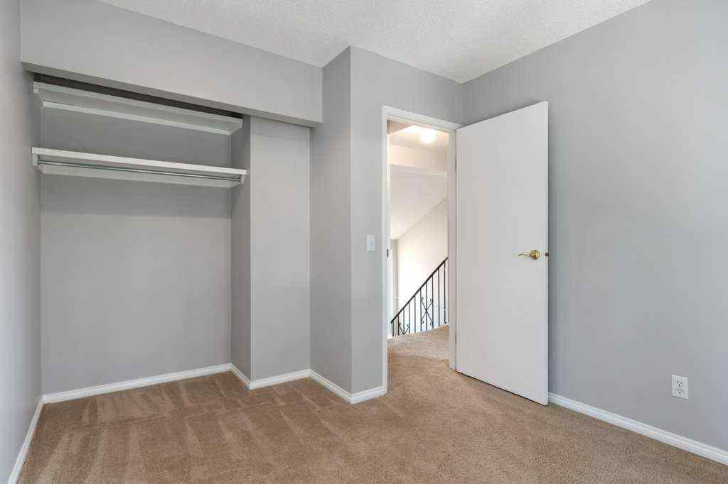MLS® A2257022 - Unit #104 829 Coach Bluff Crescent SW in Coach Hill Calgary, Residential