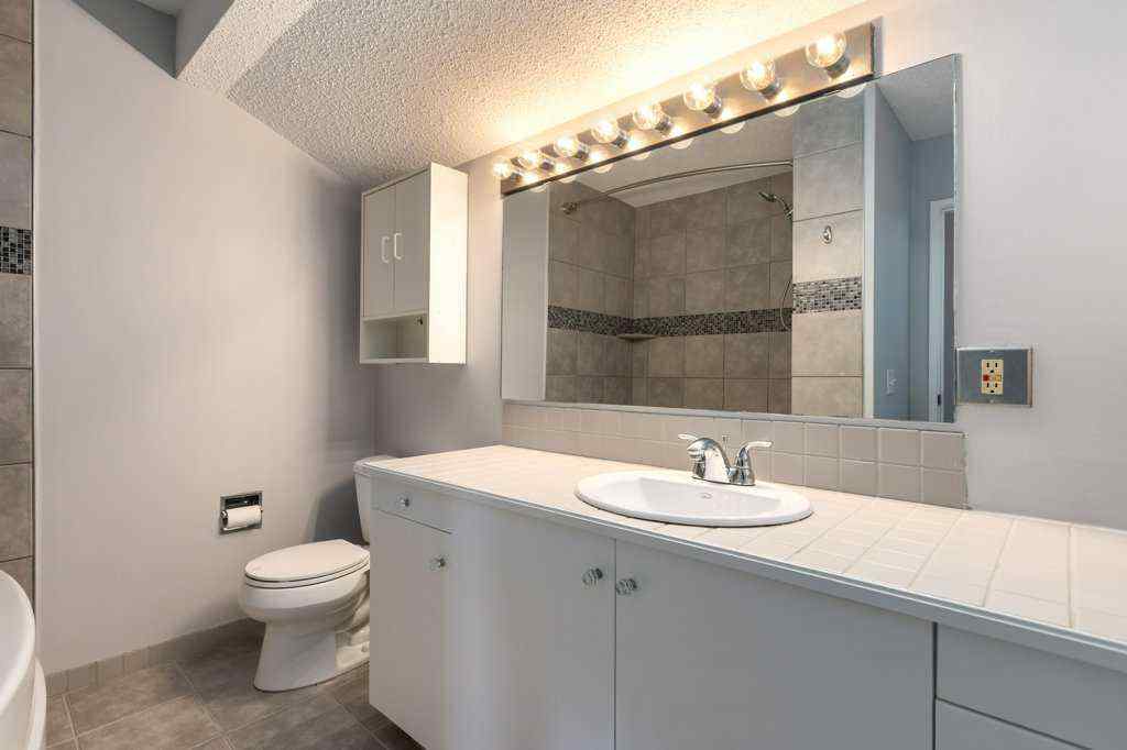 MLS® A2257022 - Unit #104 829 Coach Bluff Crescent SW in Coach Hill Calgary, Residential