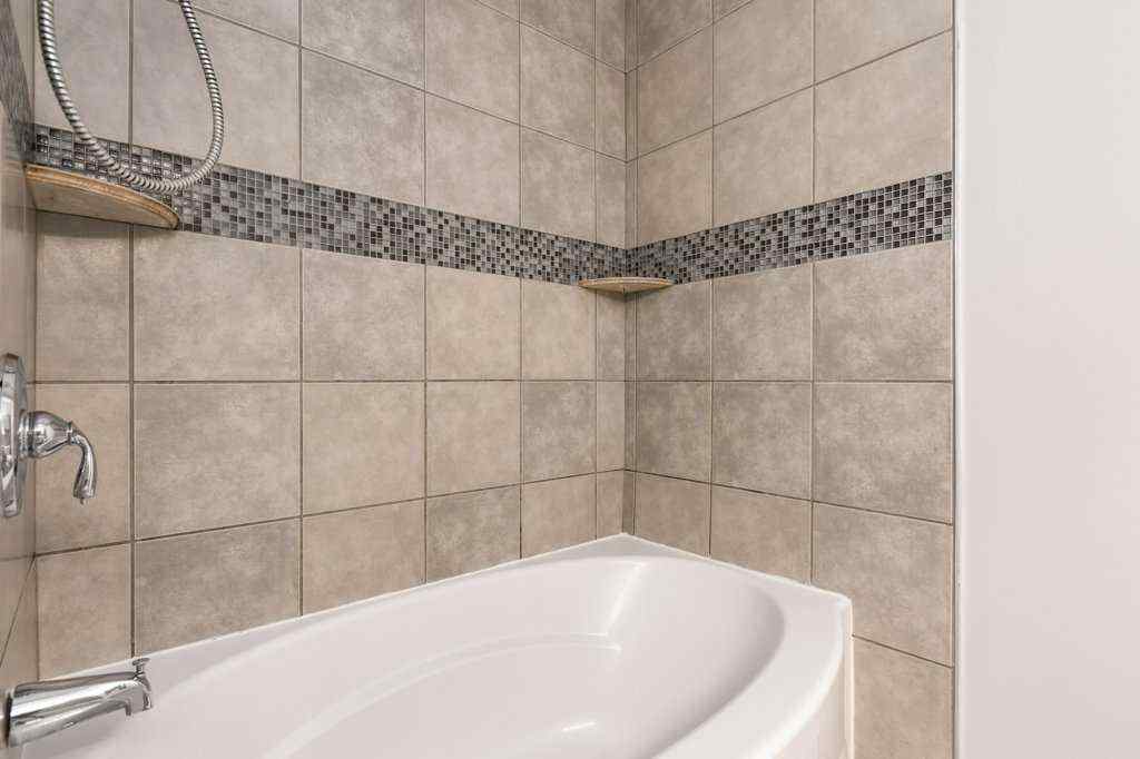 MLS® A2257022 - Unit #104 829 Coach Bluff Crescent SW in Coach Hill Calgary, Residential