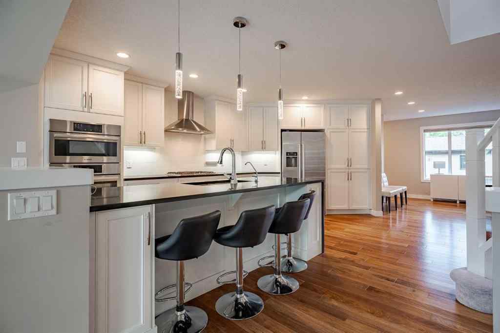 MLS® A2257023 - 2212 5 Avenue NW in West Hillhurst Calgary, Residential