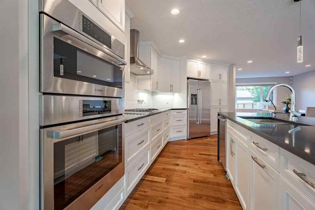 MLS® A2257023 - 2212 5 Avenue NW in West Hillhurst Calgary, Residential