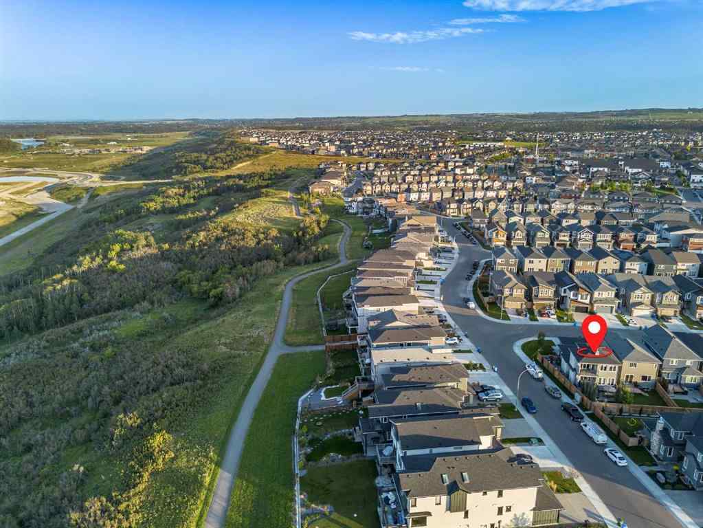 MLS® A2257074 - 60 Walcrest Hill SE in Walden Calgary, Residential