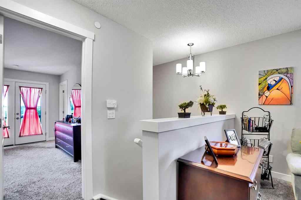 MLS® A2257082 - 64 Howse Drive NE in Livingston Calgary, Residential
