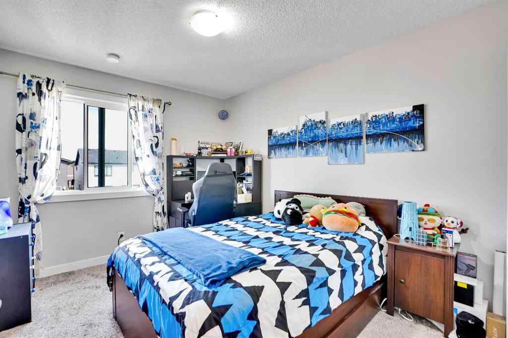 MLS® A2257082 - 64 Howse Drive NE in Livingston Calgary, Residential