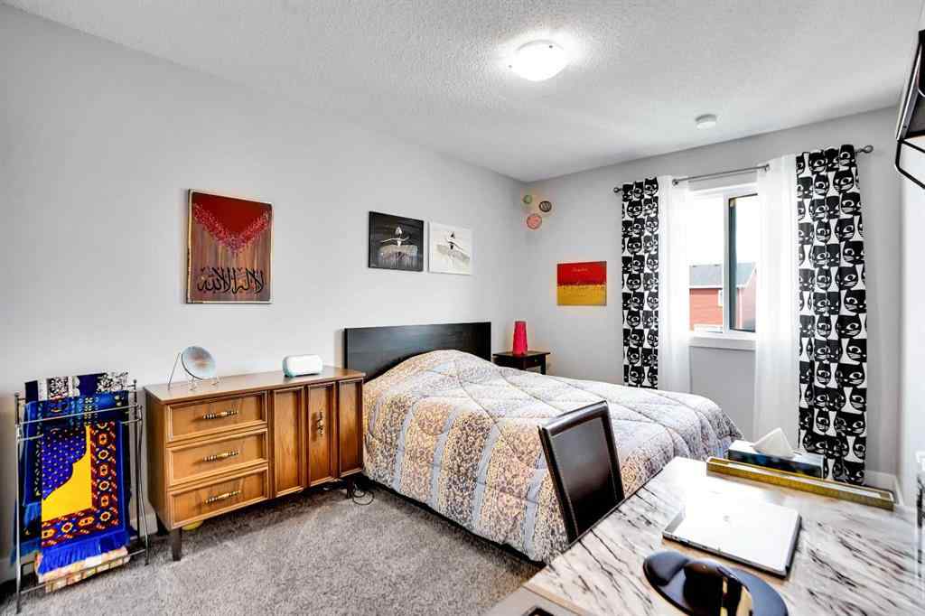 MLS® A2257082 - 64 Howse Drive NE in Livingston Calgary, Residential