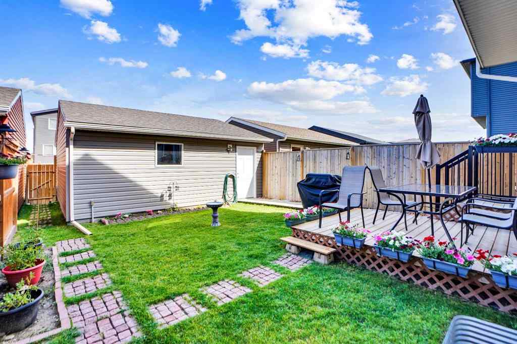 MLS® A2257082 - 64 Howse Drive NE in Livingston Calgary, Residential