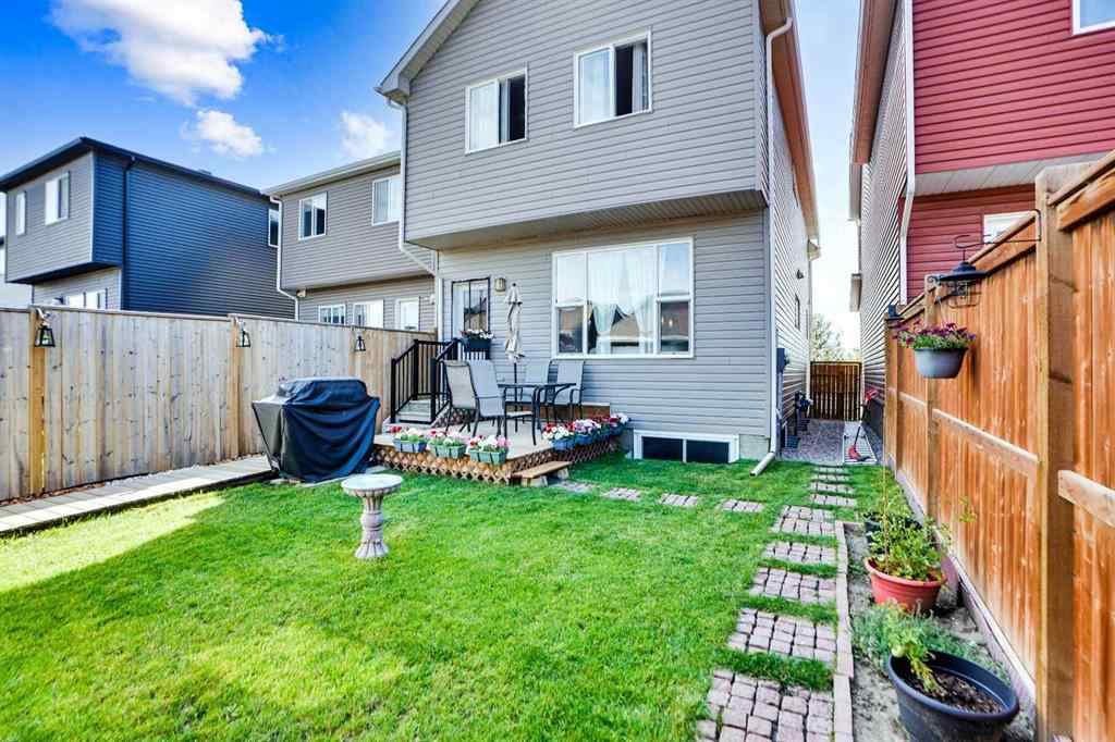 MLS® A2257082 - 64 Howse Drive NE in Livingston Calgary, Residential