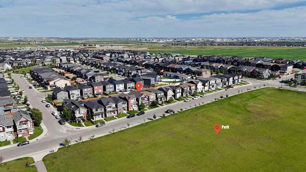 MLS® A2257082 - 64 Howse Drive NE in Livingston Calgary, Residential