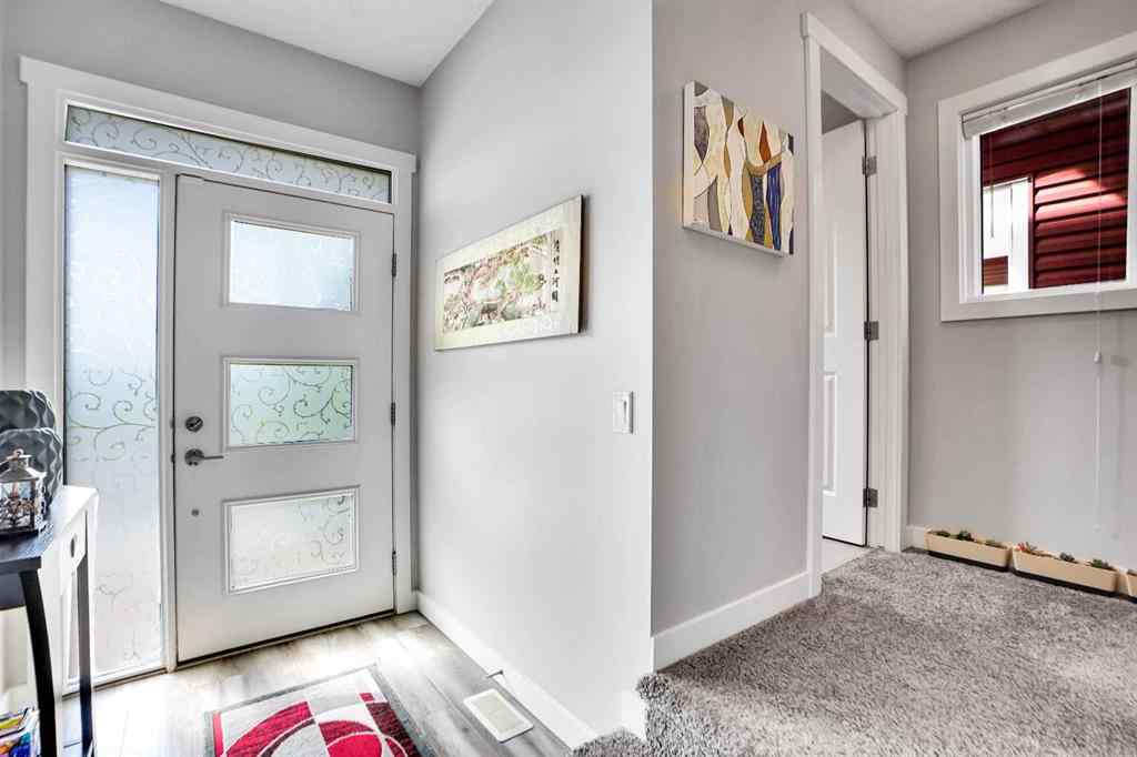 MLS® A2257082 - 64 Howse Drive NE in Livingston Calgary, Residential