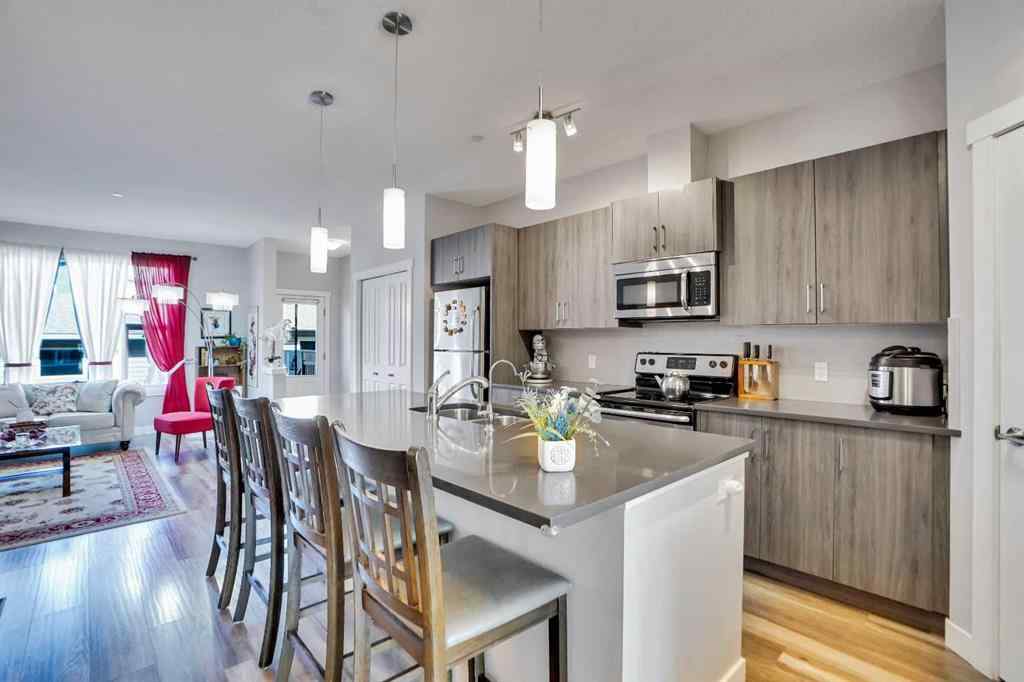 MLS® A2257082 - 64 Howse Drive NE in Livingston Calgary, Residential