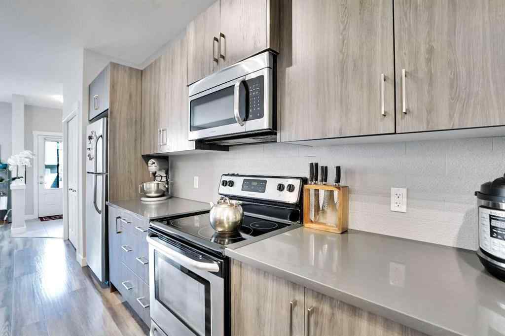 MLS® A2257082 - 64 Howse Drive NE in Livingston Calgary, Residential