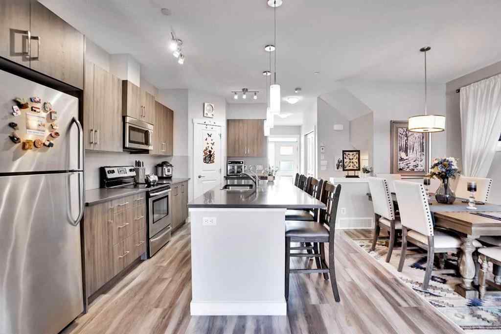 MLS® A2257082 - 64 Howse Drive NE in Livingston Calgary, Residential