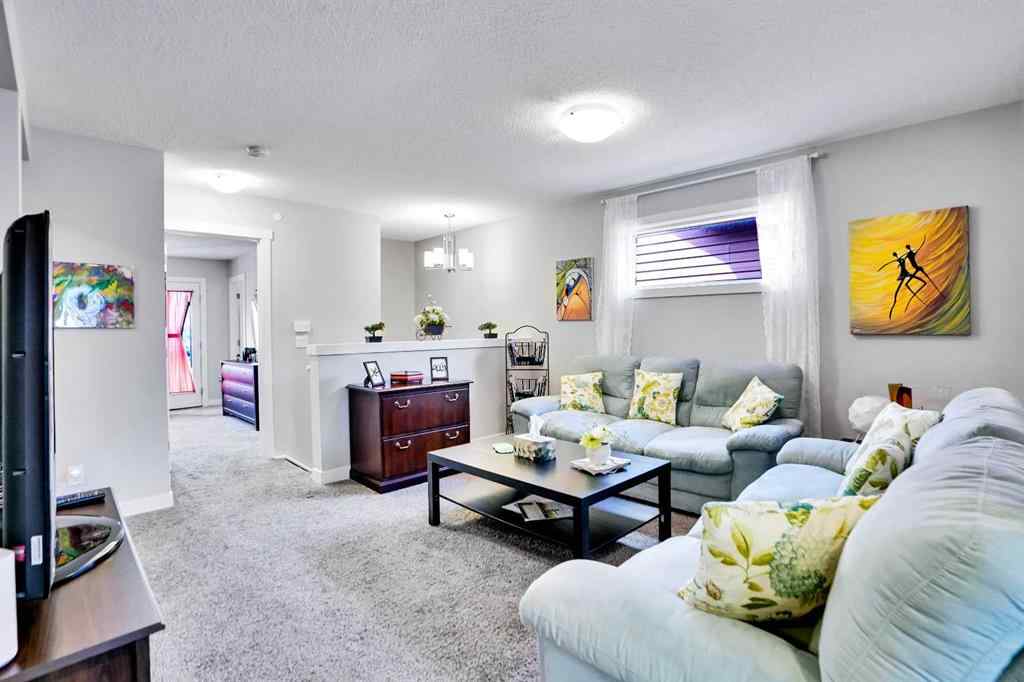 MLS® A2257082 - 64 Howse Drive NE in Livingston Calgary, Residential