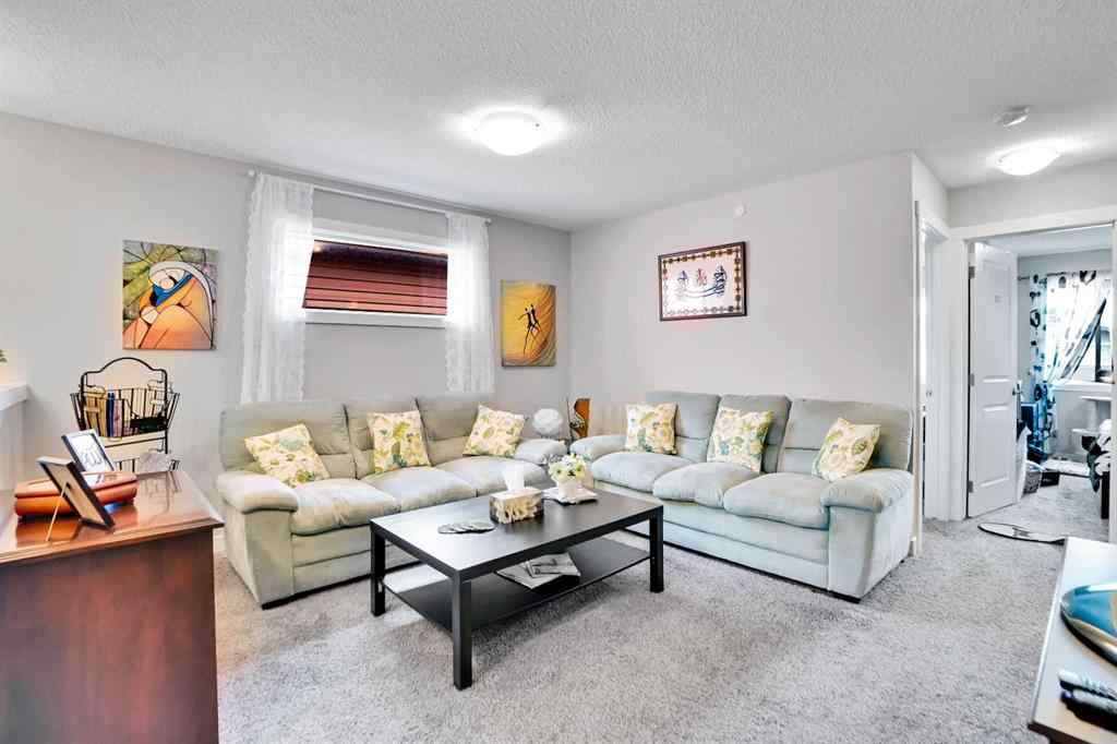MLS® A2257082 - 64 Howse Drive NE in Livingston Calgary, Residential