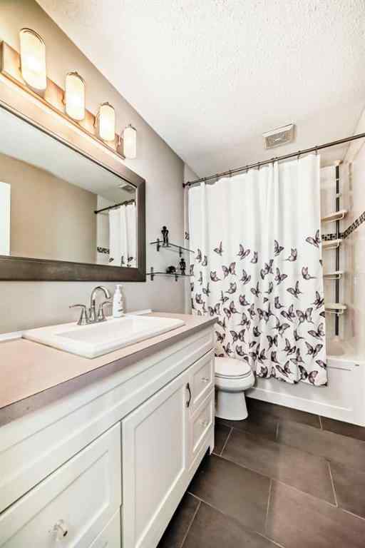 MLS® A2257087 - Unit #122 3015 51 Street SW in Glenbrook Calgary, Residential