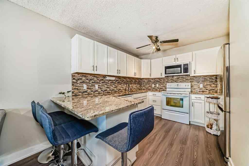 MLS® A2257087 - Unit #122 3015 51 Street SW in Glenbrook Calgary, Residential