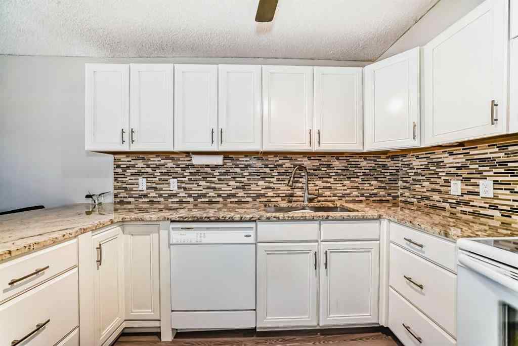 MLS® A2257087 - Unit #122 3015 51 Street SW in Glenbrook Calgary, Residential