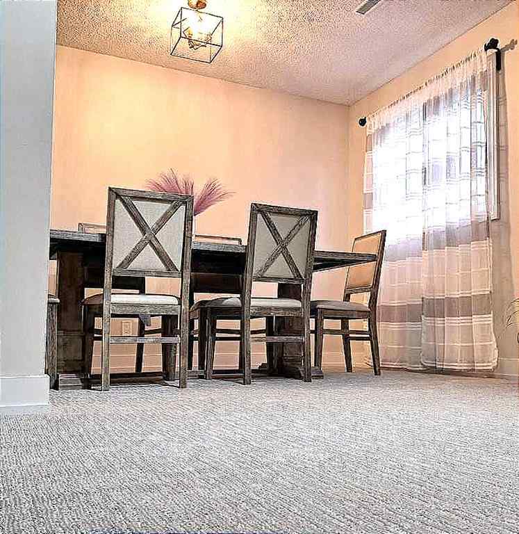 MLS® A2257087 - Unit #122 3015 51 Street SW in Glenbrook Calgary, Residential
