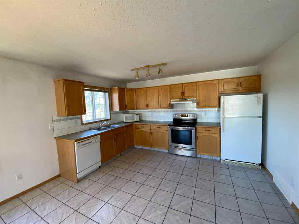 MLS® A2257095 - Unit #1A 104 Upland Trail W in Uplands Brooks, Residential