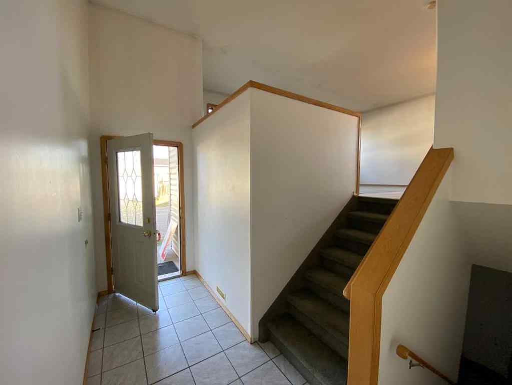 MLS® A2257095 - Unit #1A 104 Upland Trail W in Uplands Brooks, Residential