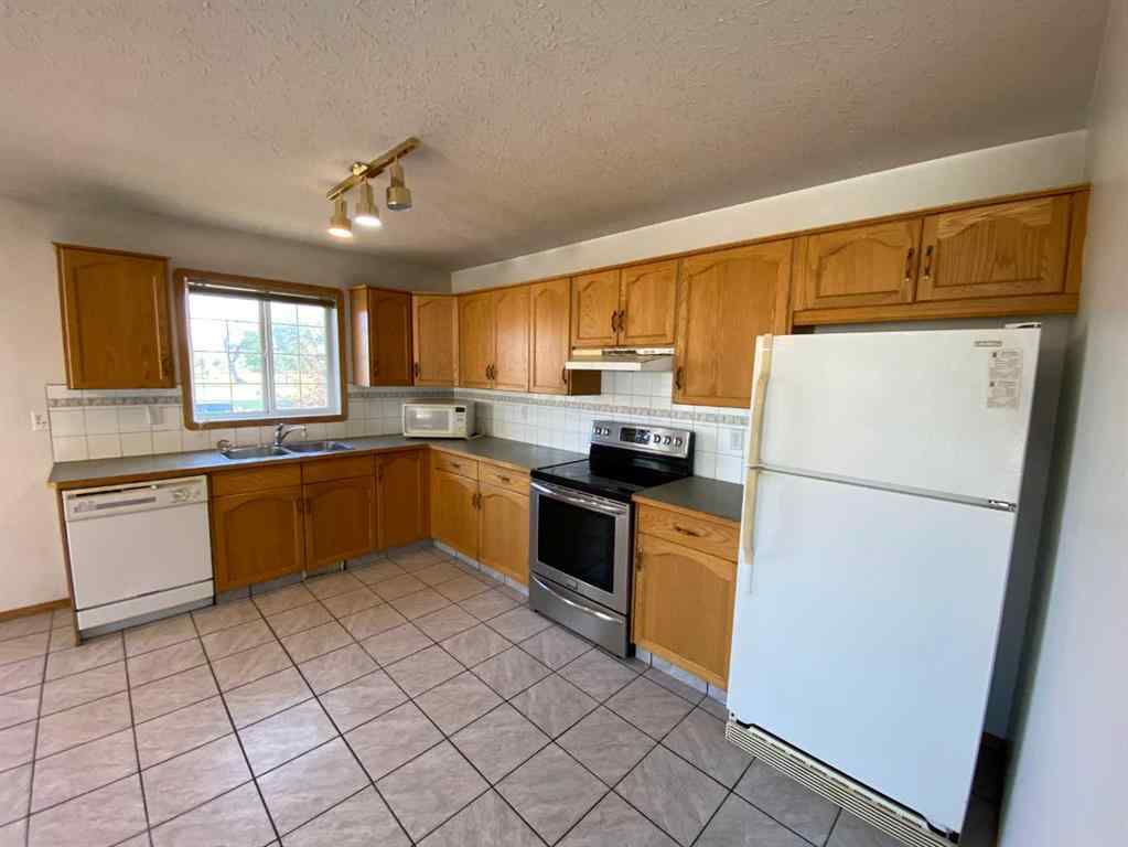 MLS® A2257095 - Unit #1A 104 Upland Trail W in Uplands Brooks, Residential