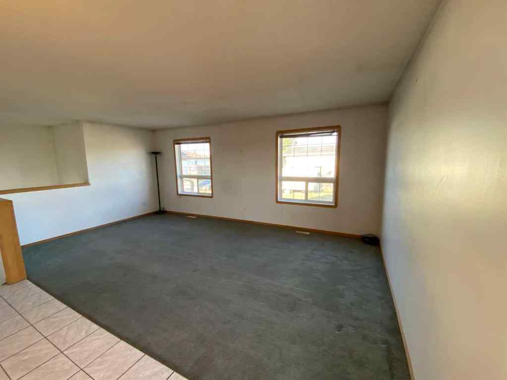 MLS® A2257095 - Unit #1A 104 Upland Trail W in Uplands Brooks, Residential