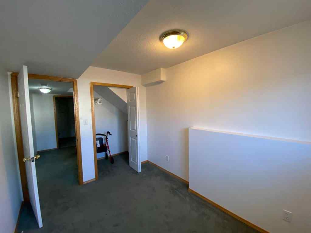 MLS® A2257095 - Unit #1A 104 Upland Trail W in Uplands Brooks, Residential