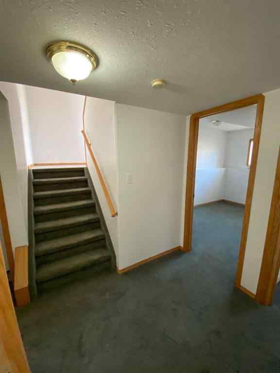 MLS® A2257095 - Unit #1A 104 Upland Trail W in Uplands Brooks, Residential
