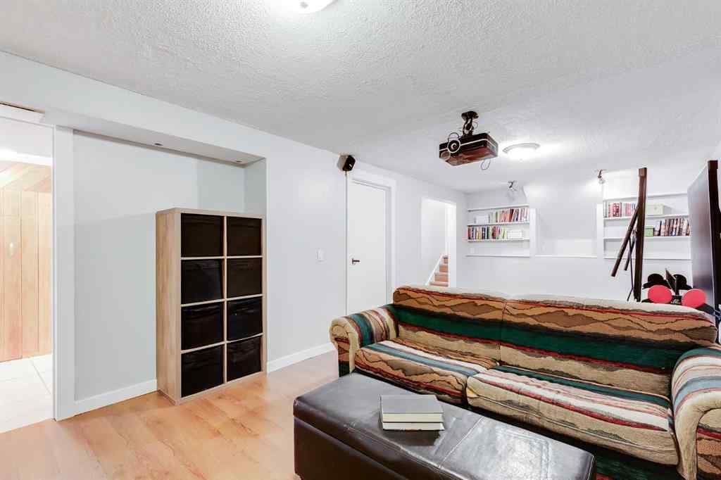 MLS® A2257101 - 1548 Lake Twintree Way SE in Lake Bonavista Calgary, Residential