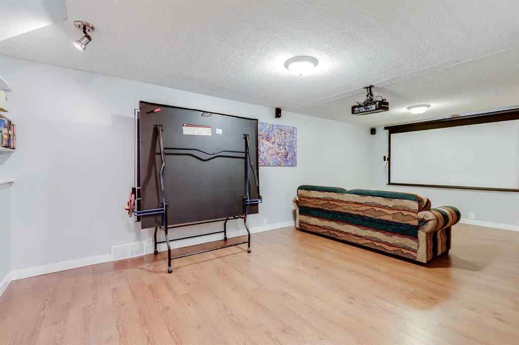 MLS® A2257101 - 1548 Lake Twintree Way SE in Lake Bonavista Calgary, Residential