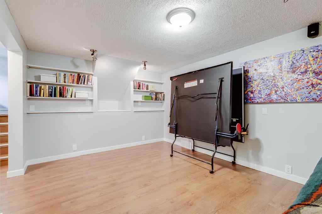 MLS® A2257101 - 1548 Lake Twintree Way SE in Lake Bonavista Calgary, Residential