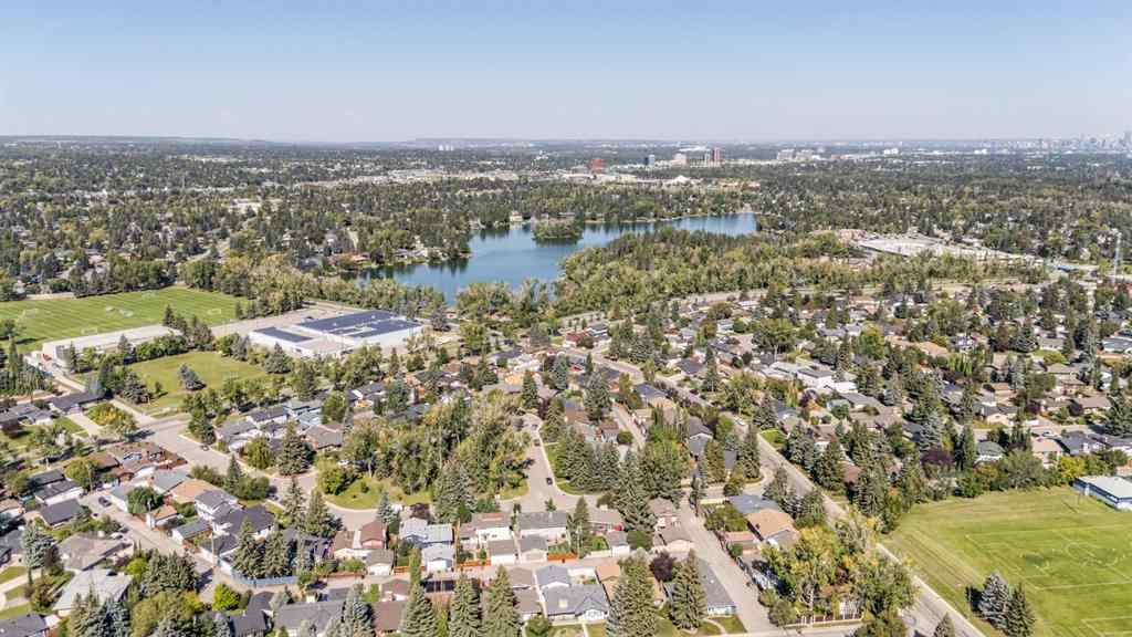 MLS® A2257101 - 1548 Lake Twintree Way SE in Lake Bonavista Calgary, Residential