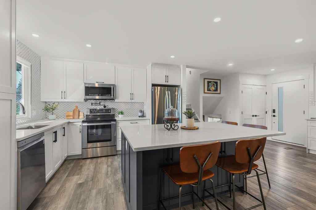 MLS® A2257101 - 1548 Lake Twintree Way SE in Lake Bonavista Calgary, Residential