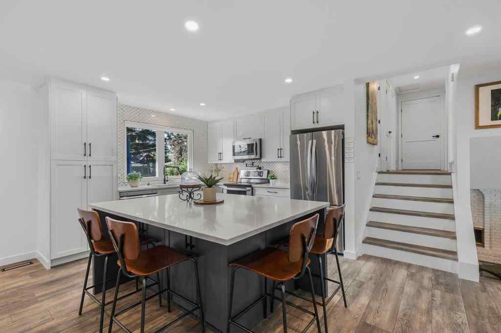 MLS® A2257101 - 1548 Lake Twintree Way SE in Lake Bonavista Calgary, Residential