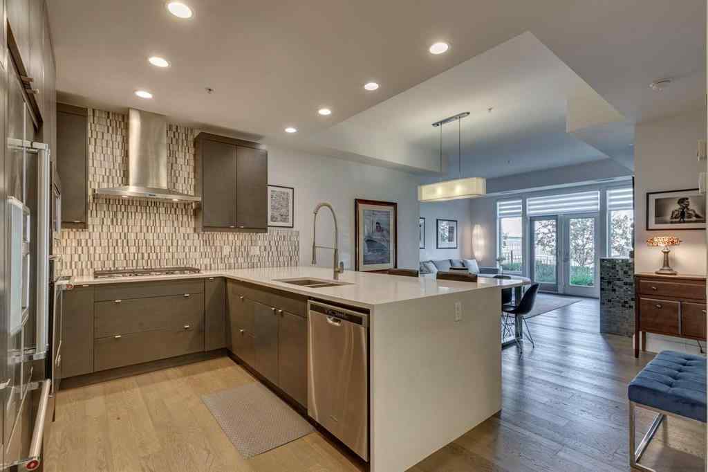 MLS® A2257105 - Unit #106 33 Burma Star Road SW in Currie Barracks Calgary, Residential