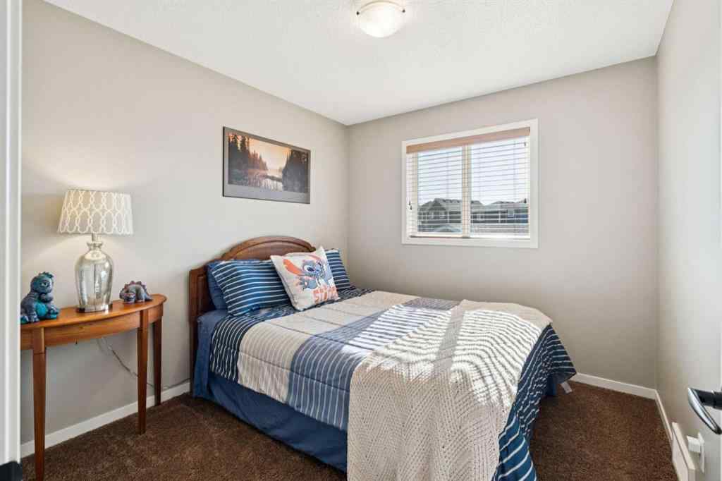 MLS® A2257109 - 234 River Heights Green  in River Heights Cochrane, Residential