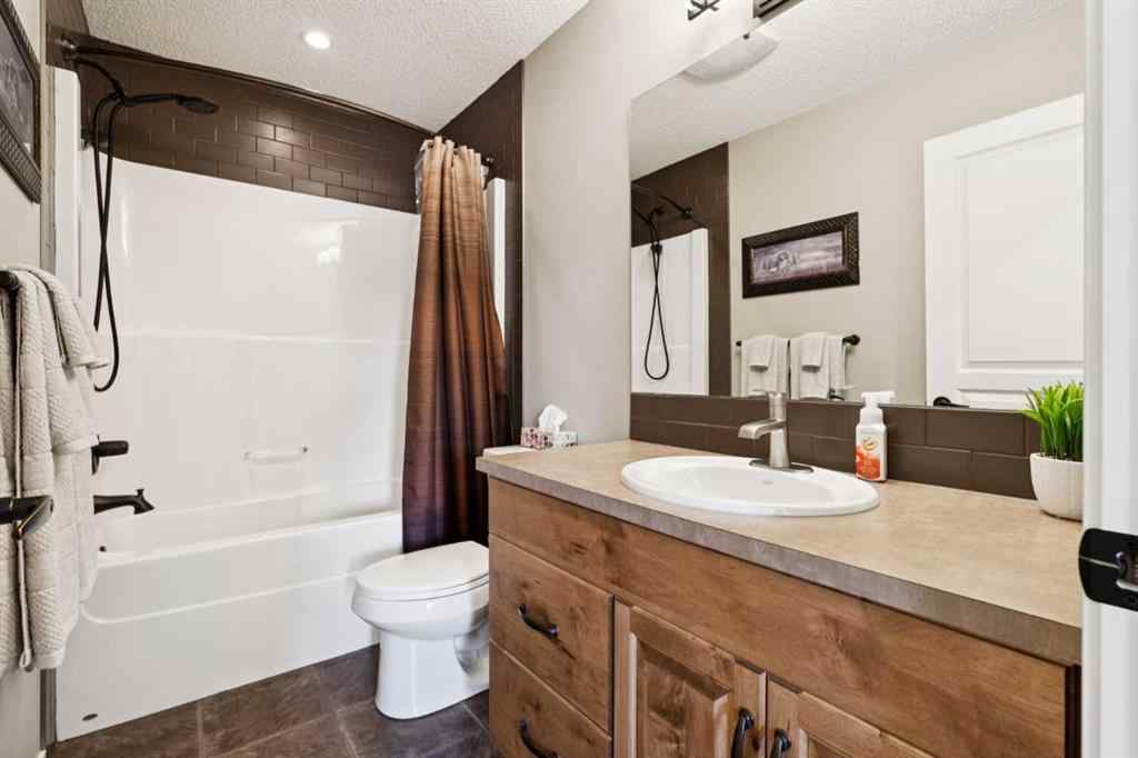 MLS® A2257109 - 234 River Heights Green  in River Heights Cochrane, Residential
