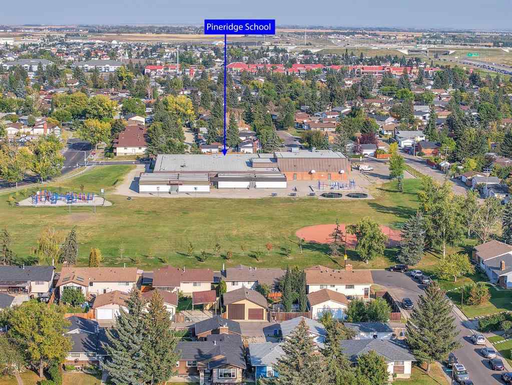 MLS® A2257122 - 2003 Pinepoint Road NE in Pineridge Calgary, Residential
