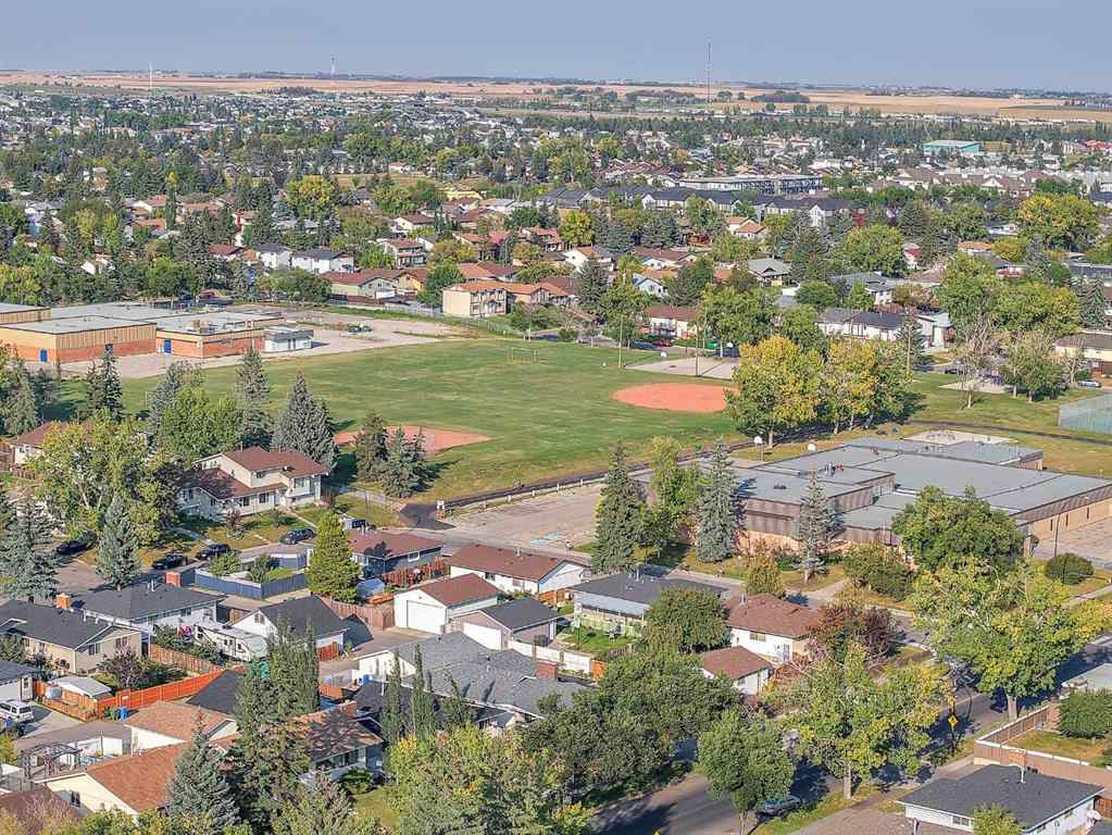 MLS® A2257122 - 2003 Pinepoint Road NE in Pineridge Calgary, Residential