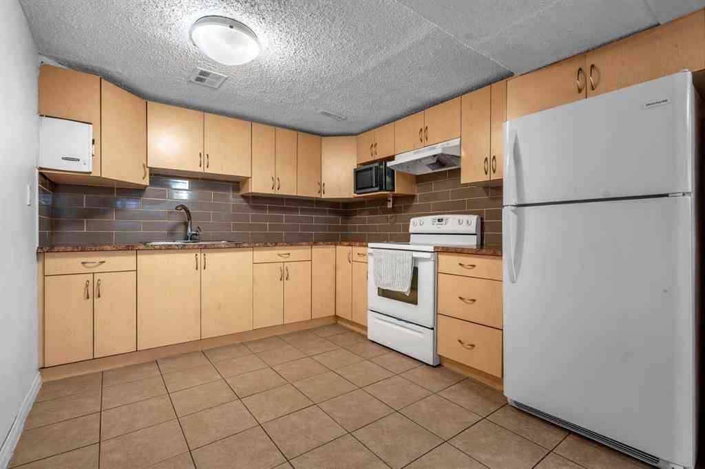 MLS® A2257122 - 2003 Pinepoint Road NE in Pineridge Calgary, Residential