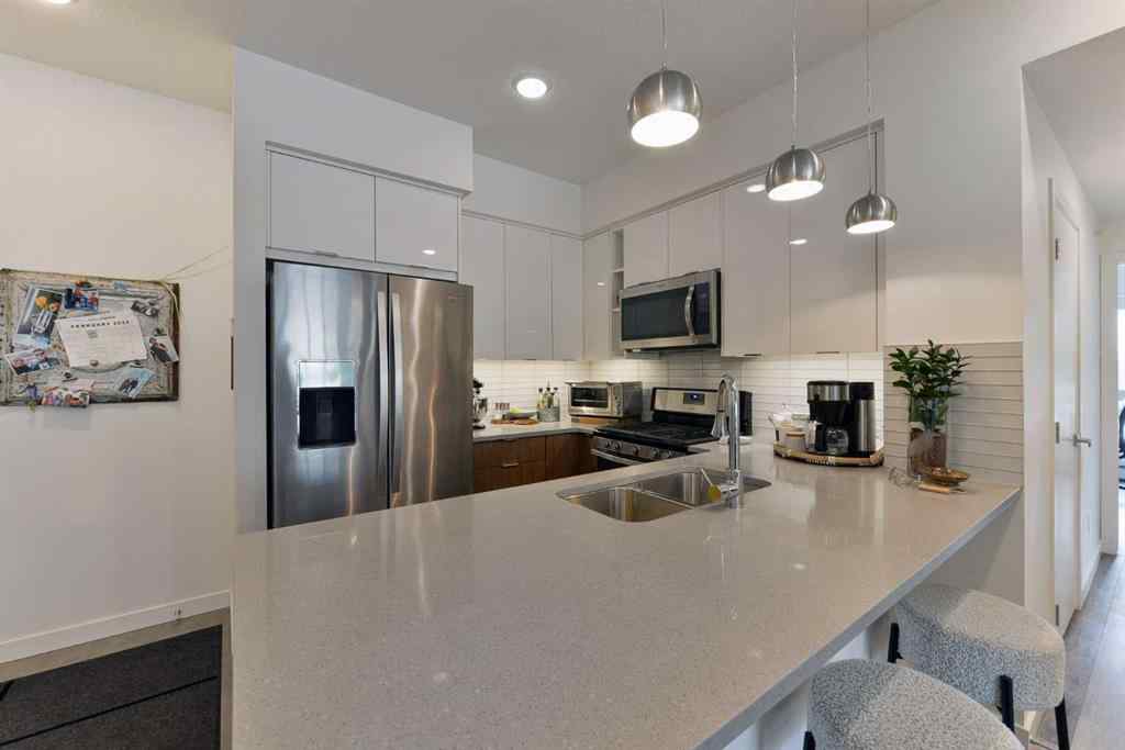 MLS® A2257124 - Unit #407 120 18 Avenue SW in Mission Calgary, Residential