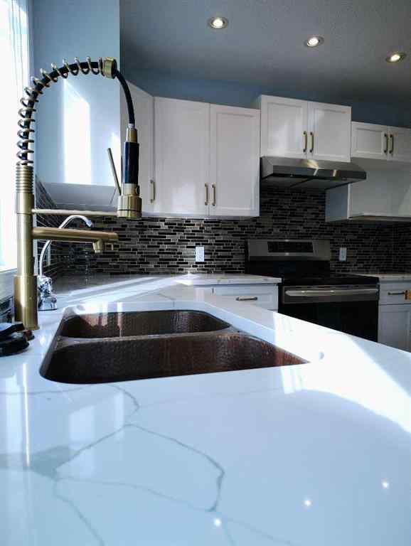 MLS® A2257126 - 11 Tuscany Valley Road NW in Tuscany Calgary, Residential