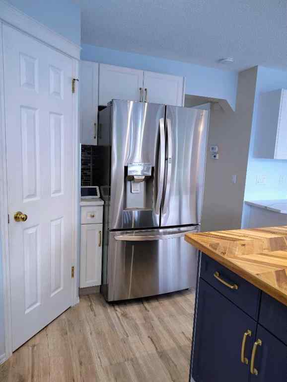 MLS® A2257126 - 11 Tuscany Valley Road NW in Tuscany Calgary, Residential