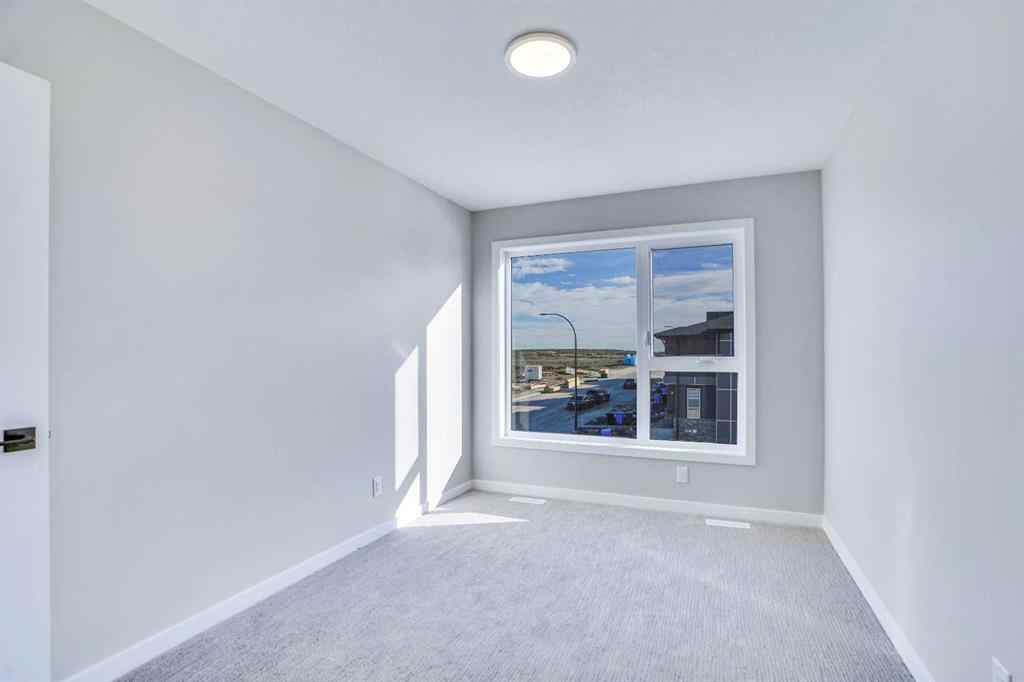 MLS® A2257129 - 305 lucas Place NW in Livingston Calgary, Residential