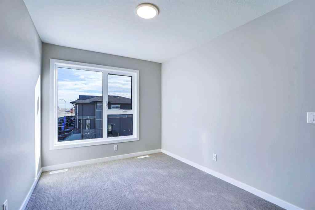 MLS® A2257129 - 305 lucas Place NW in Livingston Calgary, Residential