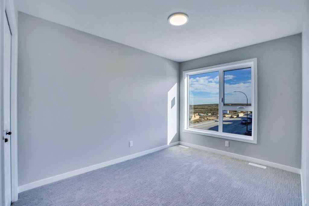 MLS® A2257129 - 305 lucas Place NW in Livingston Calgary, Residential
