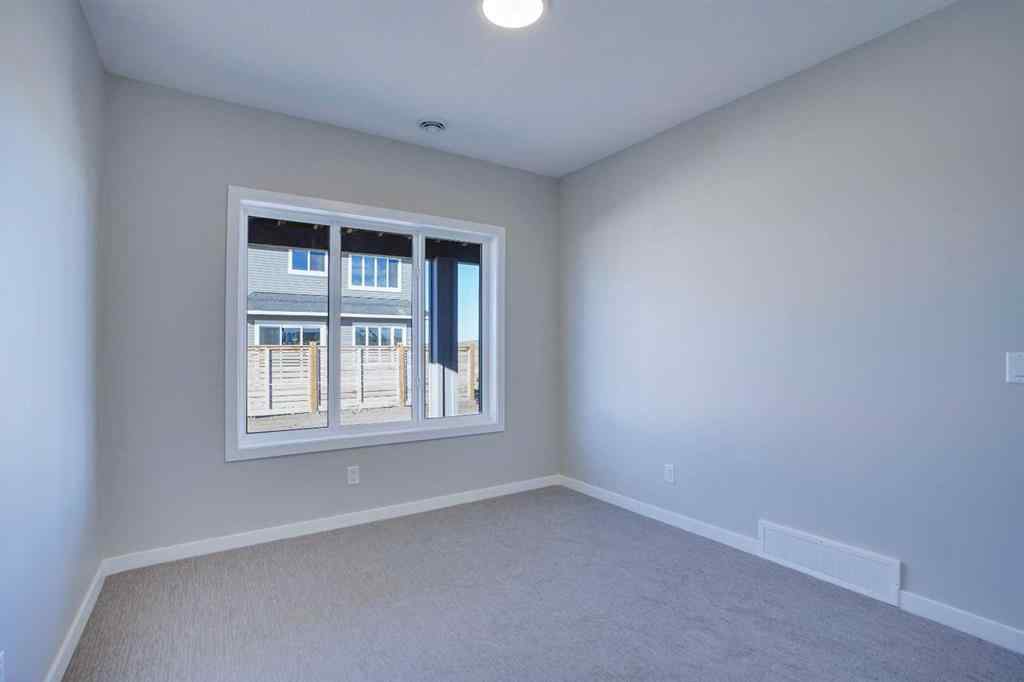 MLS® A2257129 - 305 lucas Place NW in Livingston Calgary, Residential
